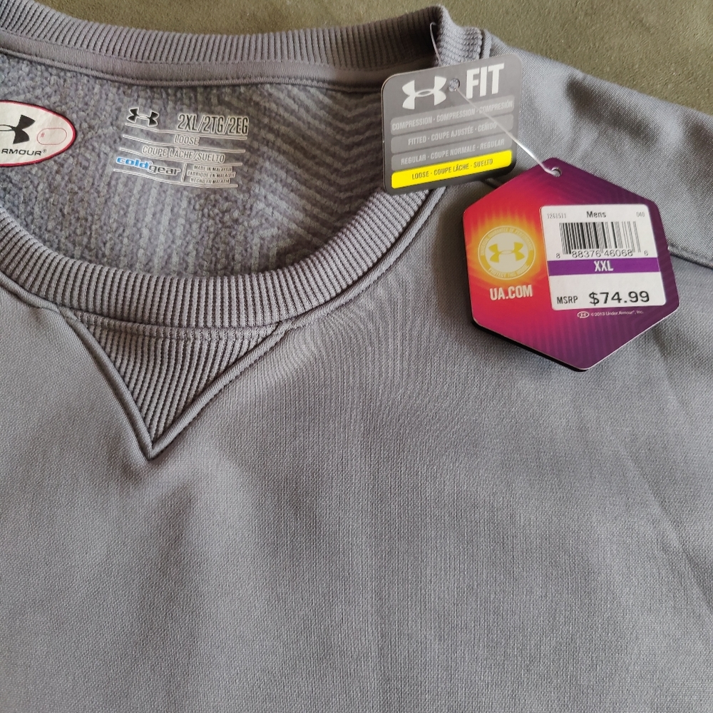 UA pullover. Brand New. Never worn